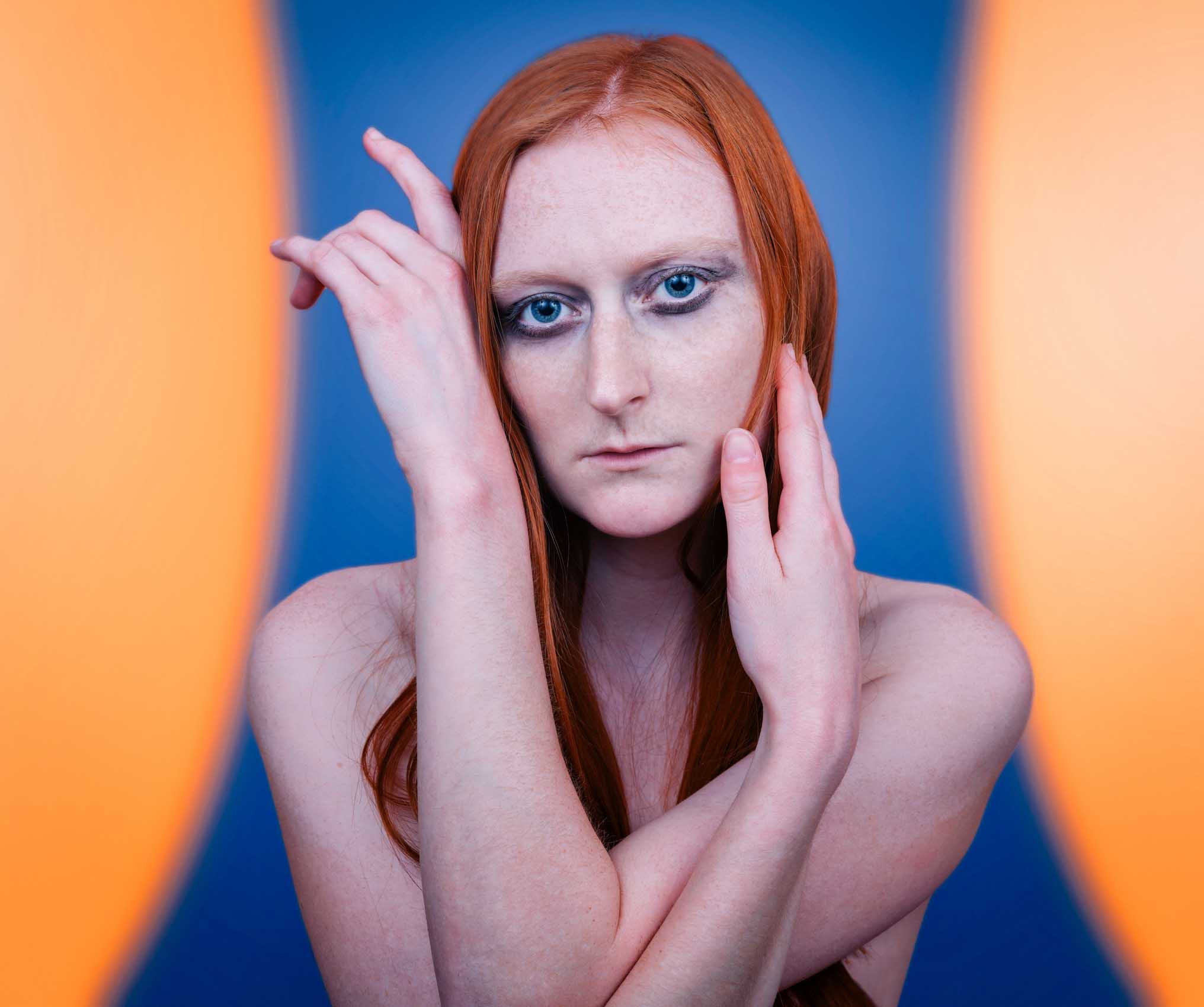 Red Head On Blue And Yellow