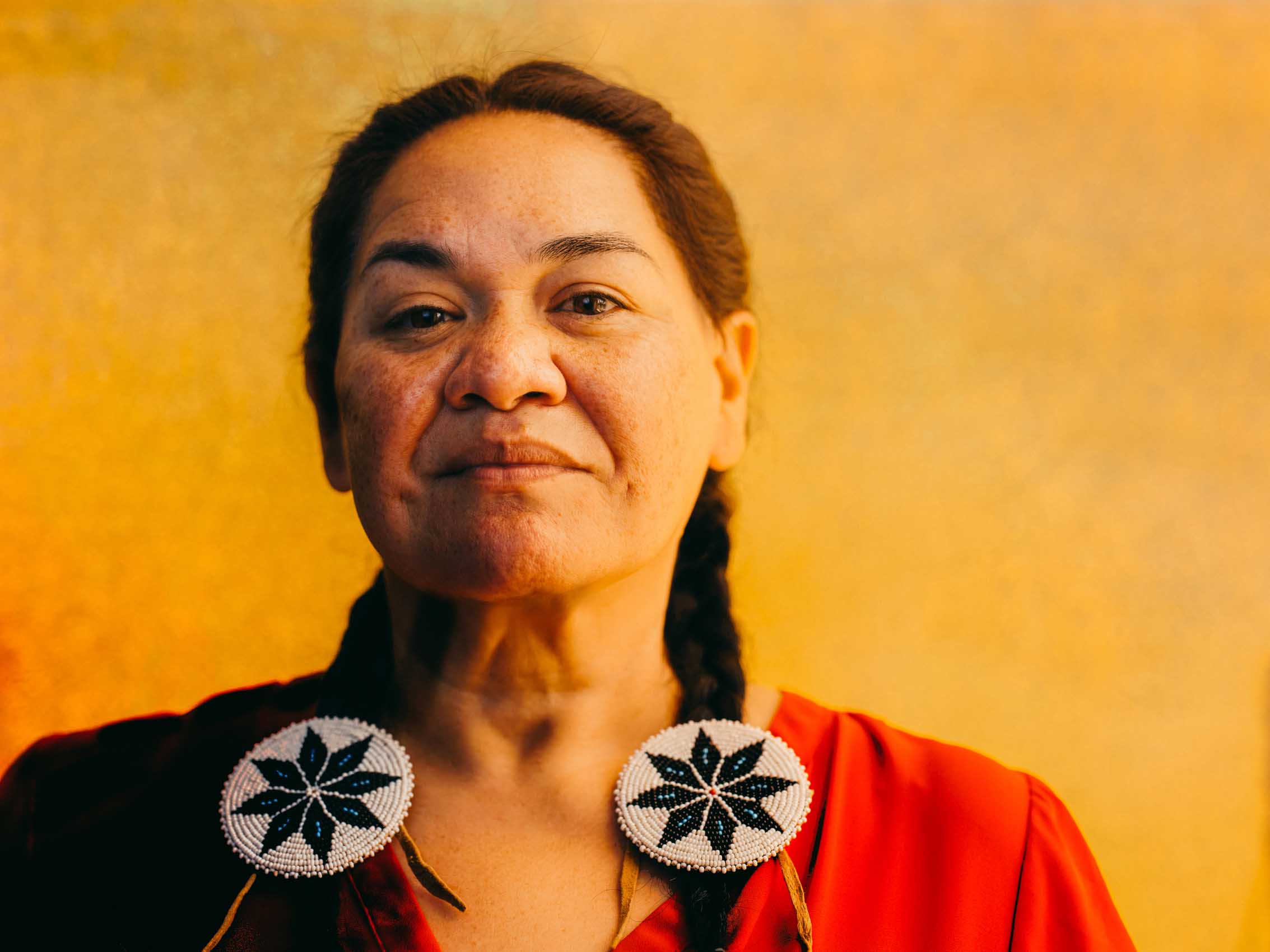Portrait Of A Native American Woman With Heritage Jewelry